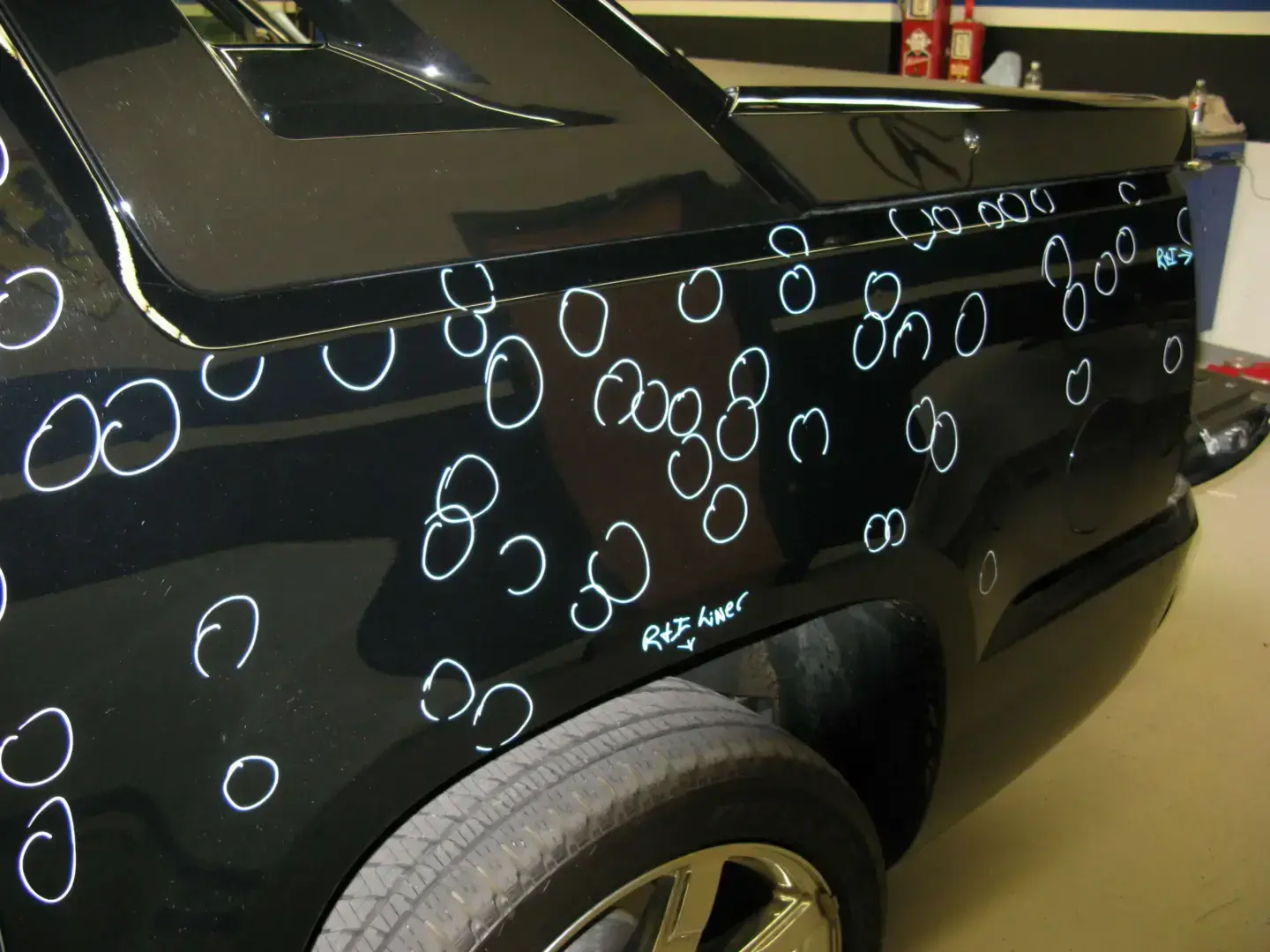 Car with numerous white circles