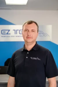 Man in black polo shirt