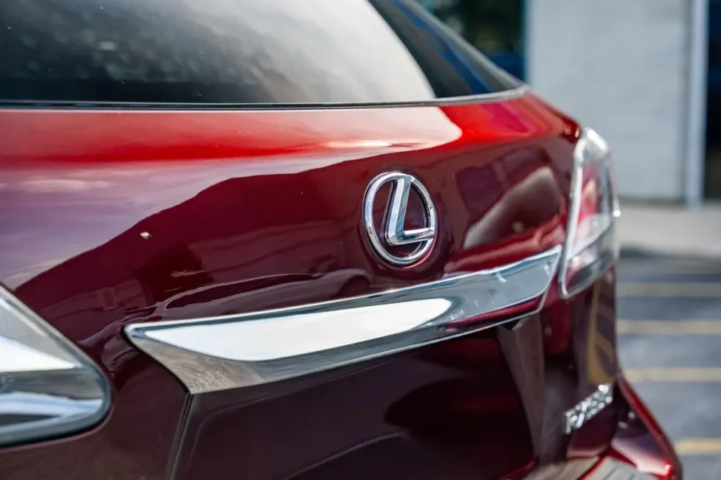 Red Lexus vehicle showcasing collision repair and restoration work by EZ Tech PDR.