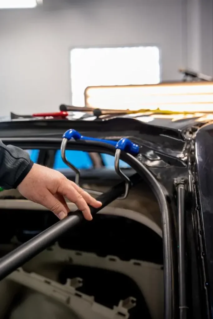 Body panel repair tools and equipment for precision dent removal and restoration.